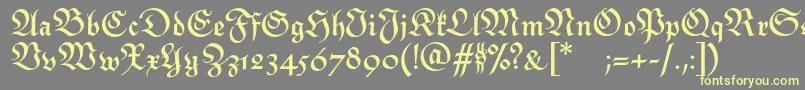 MonarchiaBold Font – Yellow Fonts on Gray Background