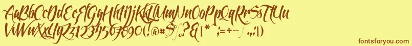 フォントFeathergraphyClean – 茶色の文字が黄色の背景にあります。