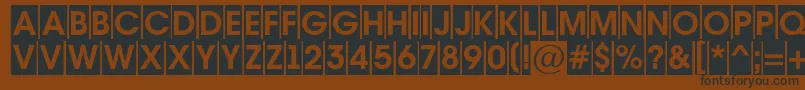 AAvantetitulcmBold-fontti – mustat fontit ruskealla taustalla