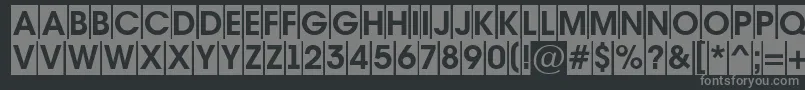 AAvantetitulcmBold-fontti – harmaat kirjasimet mustalla taustalla