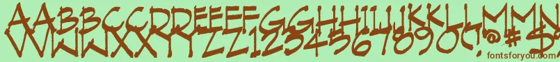 VranicHand Font – Brown Fonts on Green Background