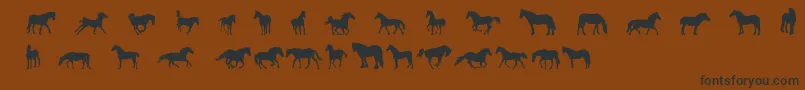 DjHorses1-Schriftart – Schwarze Schriften auf braunem Hintergrund