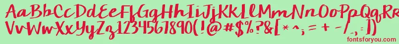 フォントKgchelseamarketscript – 赤い文字の緑の背景