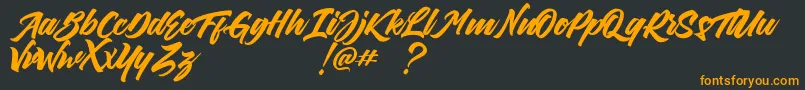 DillandaCaligraphyScriptDemo Font – Orange Fonts on Black Background