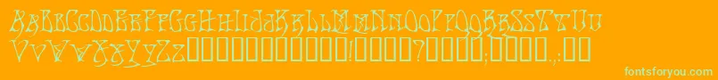 フォントBadacidTM – オレンジの背景に緑のフォント