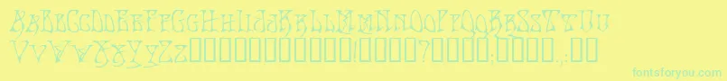 BadacidTM Font – Green Fonts on Yellow Background