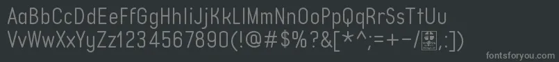 Czcionka TypoQuikLightDemo – szare czcionki na czarnym tle