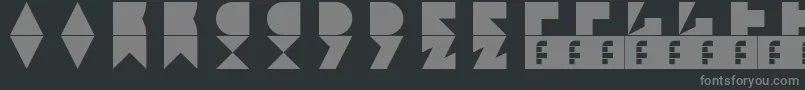 Jamstone-fontti – harmaat kirjasimet mustalla taustalla