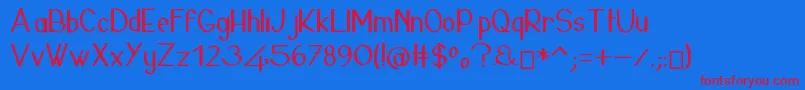 フォント24janvierLight – 赤い文字の青い背景