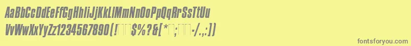 フォントCompactaItalicPlain – 黄色の背景に灰色の文字