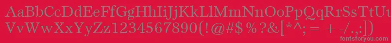 ItcEspritLtBook-fontti – harmaat kirjasimet punaisella taustalla