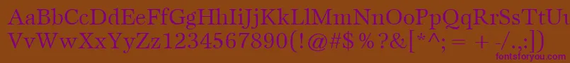 ItcEspritLtBook-fontti – violetit fontit ruskealla taustalla