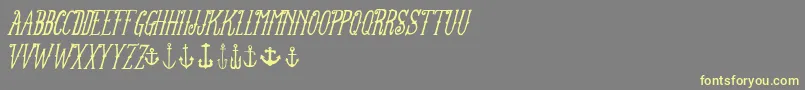 FtanchoryardItalic-Schriftart – Gelbe Schriften auf grauem Hintergrund