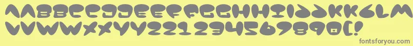 Jackson-fontti – harmaat kirjasimet keltaisella taustalla