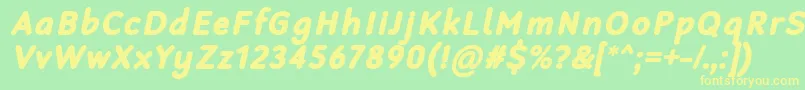 RobagaRoundedBlackItalic-fontti – keltaiset fontit vihreällä taustalla