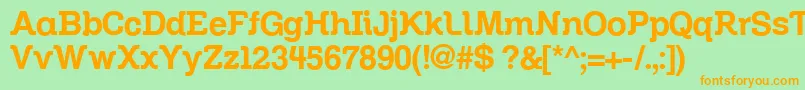 フォントZil – オレンジの文字が緑の背景にあります。