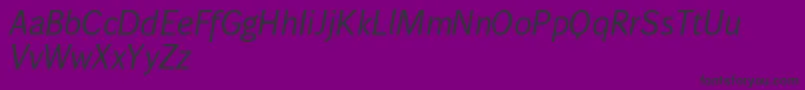 Wendelinnormalkursiv-fontti – mustat fontit violetilla taustalla