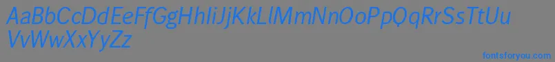 Wendelinnormalkursiv-Schriftart – Blaue Schriften auf grauem Hintergrund