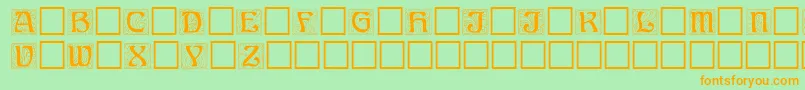 フォントAnnregular – オレンジの文字が緑の背景にあります。
