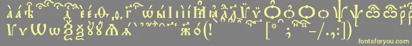 TriodionKucsSpacedout-Schriftart – Gelbe Schriften auf grauem Hintergrund