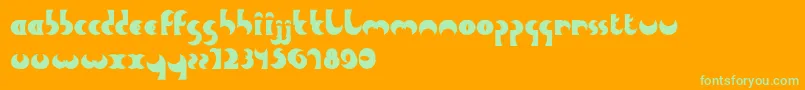 HeavyMoon-Schriftart – Grüne Schriften auf orangefarbenem Hintergrund