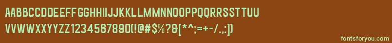 フォントGoldanaBaseFreePersonalUse – 緑色の文字が茶色の背景にあります。
