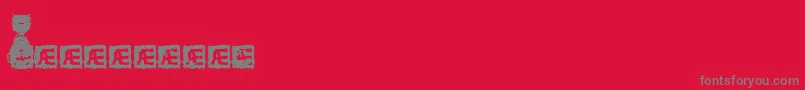 HeadDingMakerBrk-Schriftart – Graue Schriften auf rotem Hintergrund