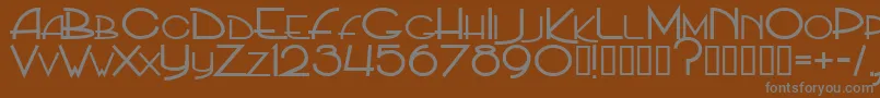 PpHip20s-fontti – harmaat kirjasimet ruskealla taustalla
