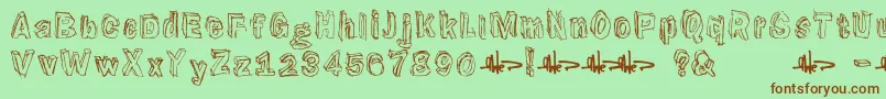 Suppenkasper Font – Brown Fonts on Green Background