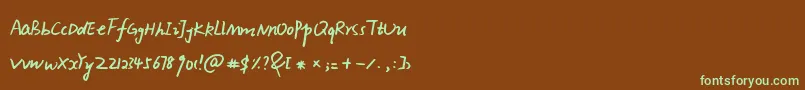 フォントXiaoGao – 緑色の文字が茶色の背景にあります。