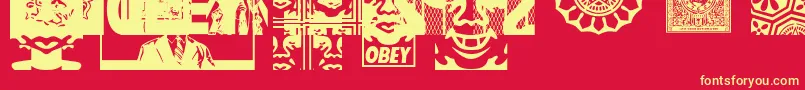Czcionka ObeyassortyCaps – żółte czcionki na czerwonym tle
