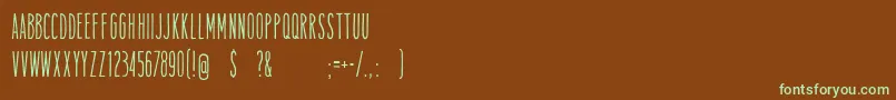 TamalesregFreeForPersonalUse-Schriftart – Grüne Schriften auf braunem Hintergrund
