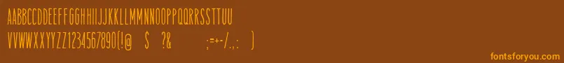 TamalesregFreeForPersonalUse Font – Orange Fonts on Brown Background