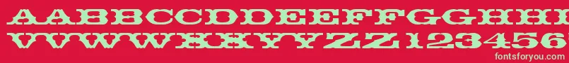 フォントThunderbirddreg – 赤い背景に緑の文字