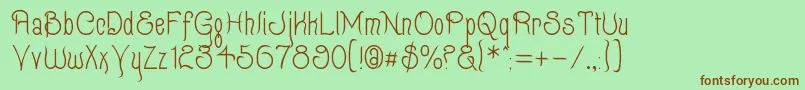 Quixotte Font – Brown Fonts on Green Background