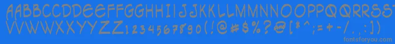 Tagacnrg-Schriftart – Graue Schriften auf blauem Hintergrund
