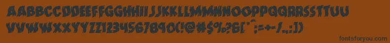 Doktermonstrowarprotal Font – Black Fonts on Brown Background