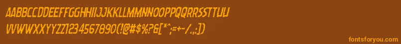 フォントWormcuisinecondital – オレンジ色の文字が茶色の背景にあります。