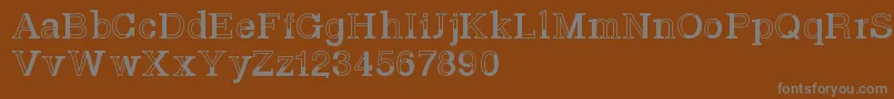 フォントBasveticafontlab – 茶色の背景に灰色の文字