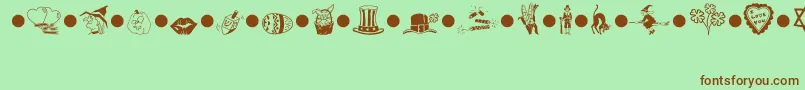 Шрифт HolidaysMt – коричневые шрифты на зелёном фоне
