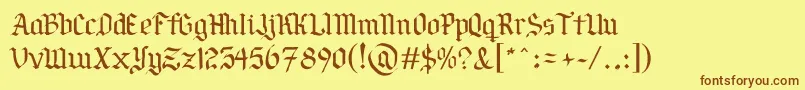 PorSiempreGРІtica Font – Brown Fonts on Yellow Background
