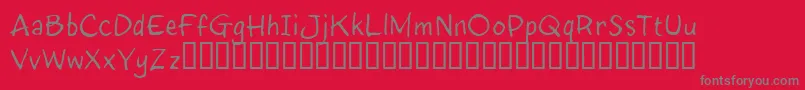 InkyRT-Schriftart – Graue Schriften auf rotem Hintergrund