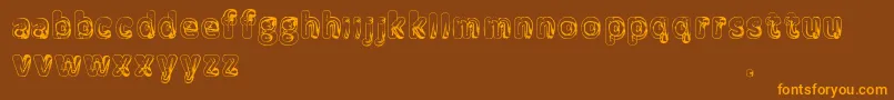 Manenschijn Font – Orange Fonts on Brown Background