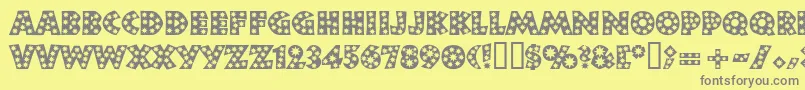フォントNeulandstar – 黄色の背景に灰色の文字