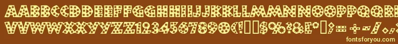 Neulandstar-fontti – keltaiset fontit ruskealla taustalla