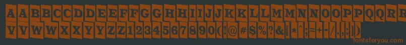 Шрифт ATrianglercmdn – коричневые шрифты на чёрном фоне