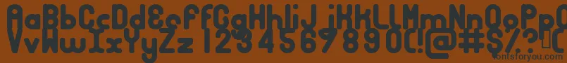 Bubbcb-fontti – mustat fontit ruskealla taustalla