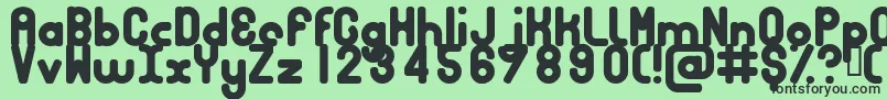 フォントBubbcb – 緑の背景に黒い文字