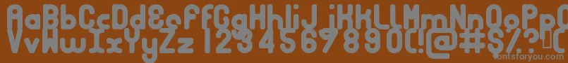 Шрифт Bubbcb – серые шрифты на коричневом фоне