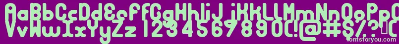 フォントBubbcb – 紫の背景に緑のフォント